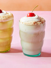 Kombucha Float with Cherries and Whipped Cream
