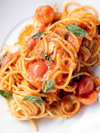 Spaghetti Quadrati with Baby Tomatoes, Olive Oil, and Basil