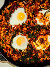Baked Eggs with Tadka Greens