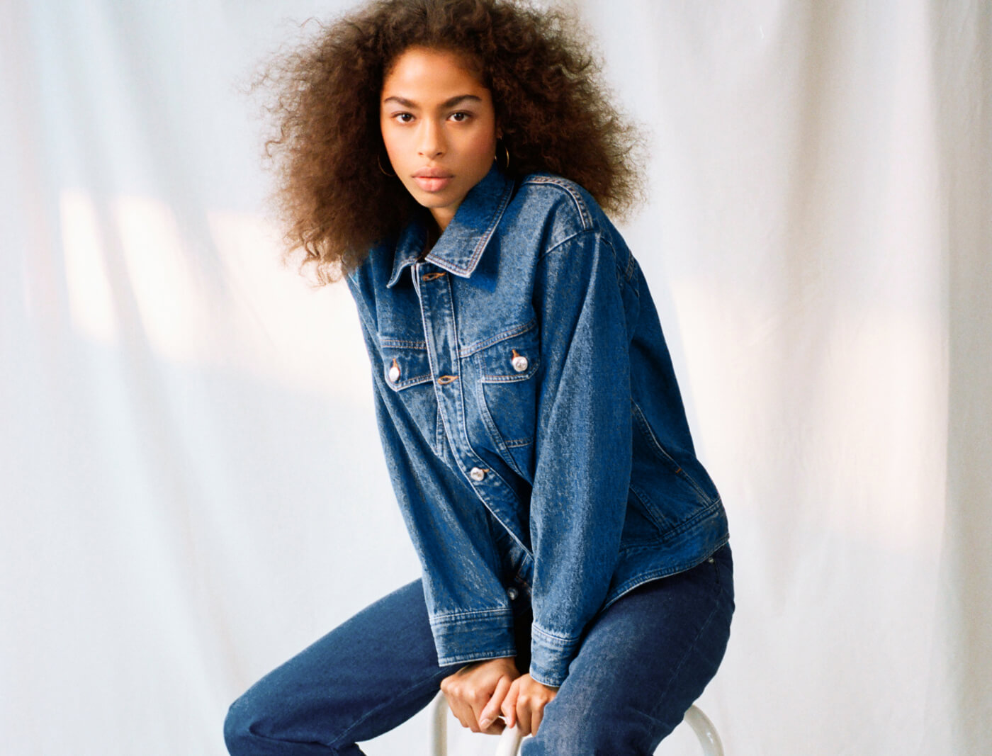 woman in denim jacket