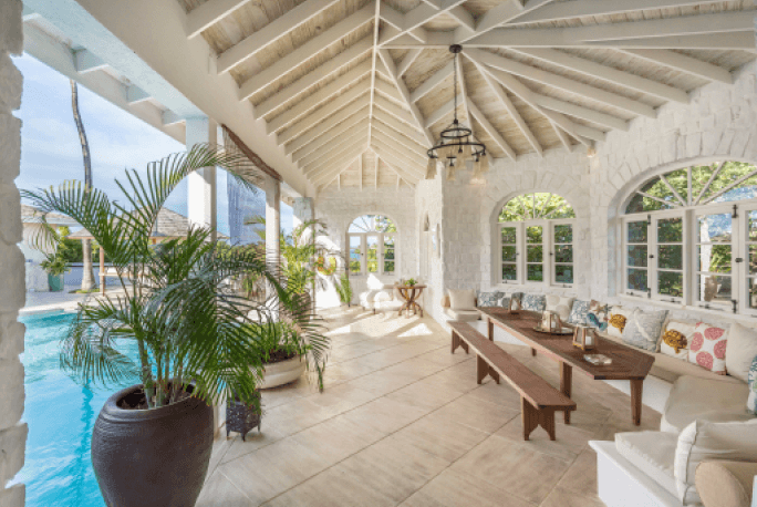 outdoor lounge area with pool