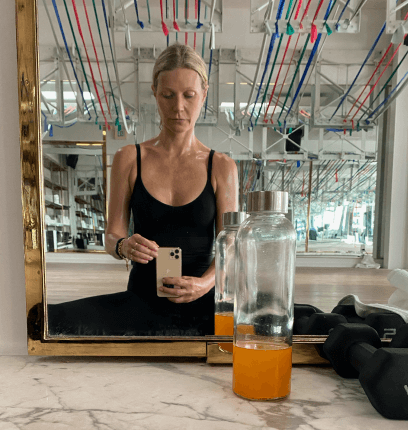 Gwyneth and Apple in workout clothes