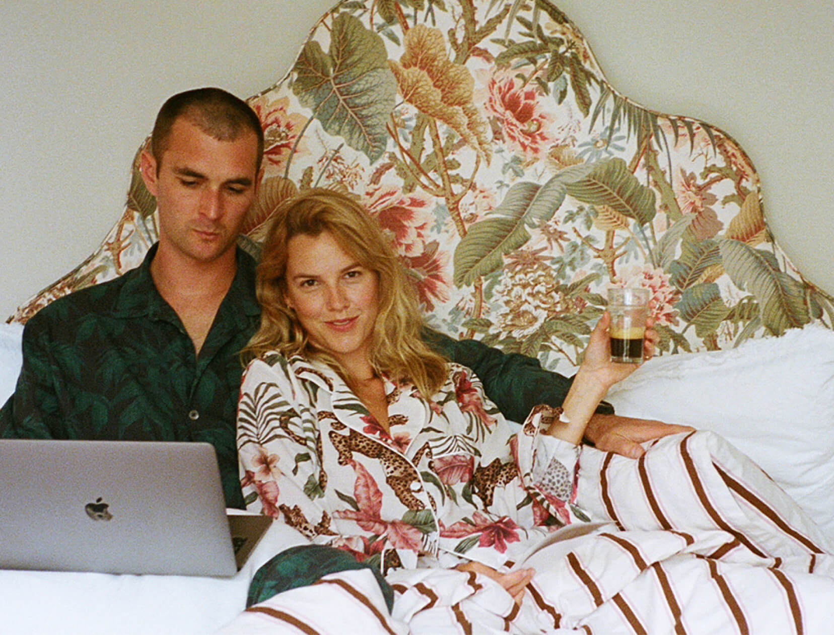 man and woman in pajamas