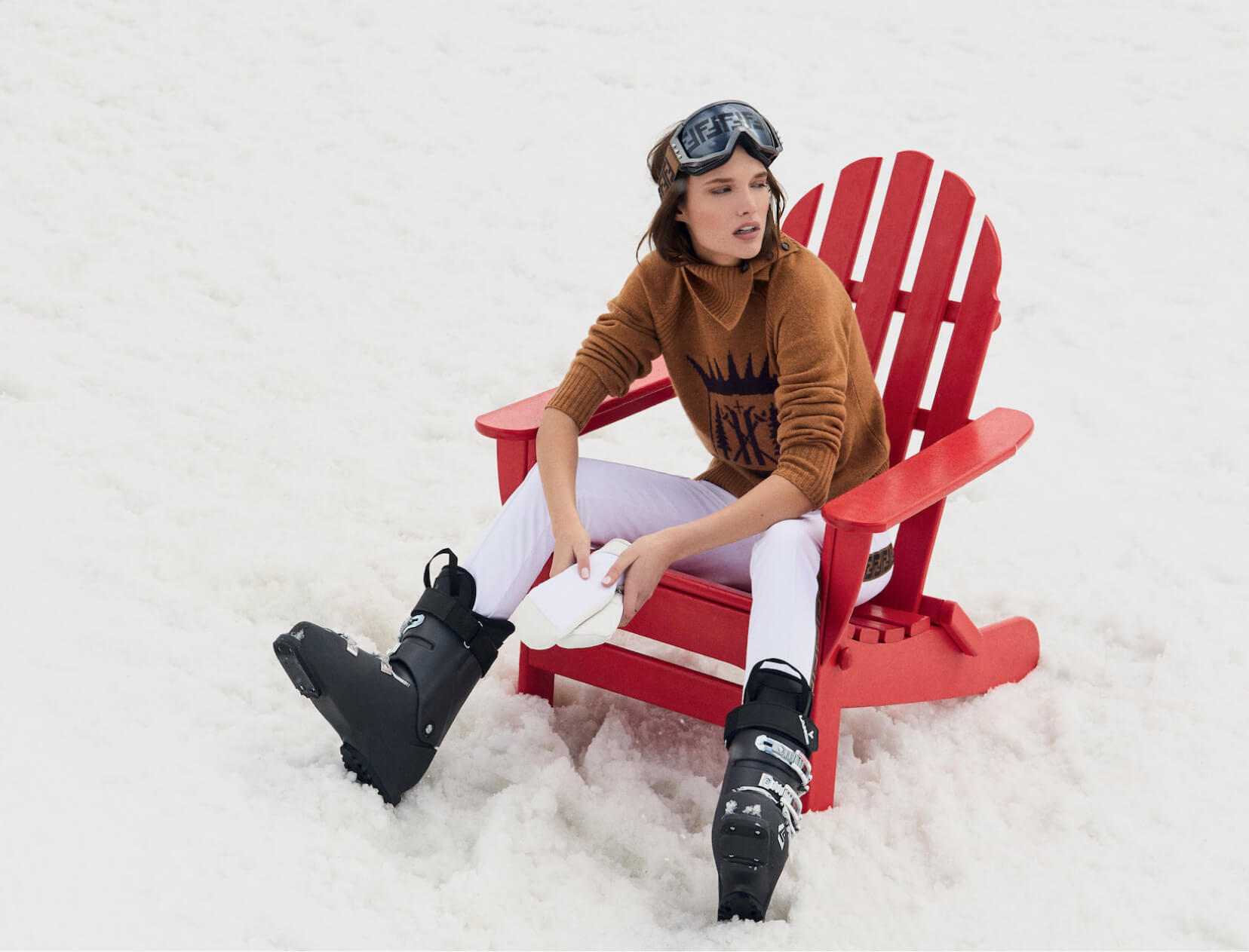 woman on chair in the snow