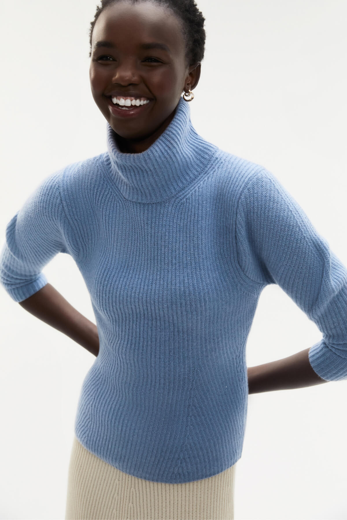 woman posing wearing g label