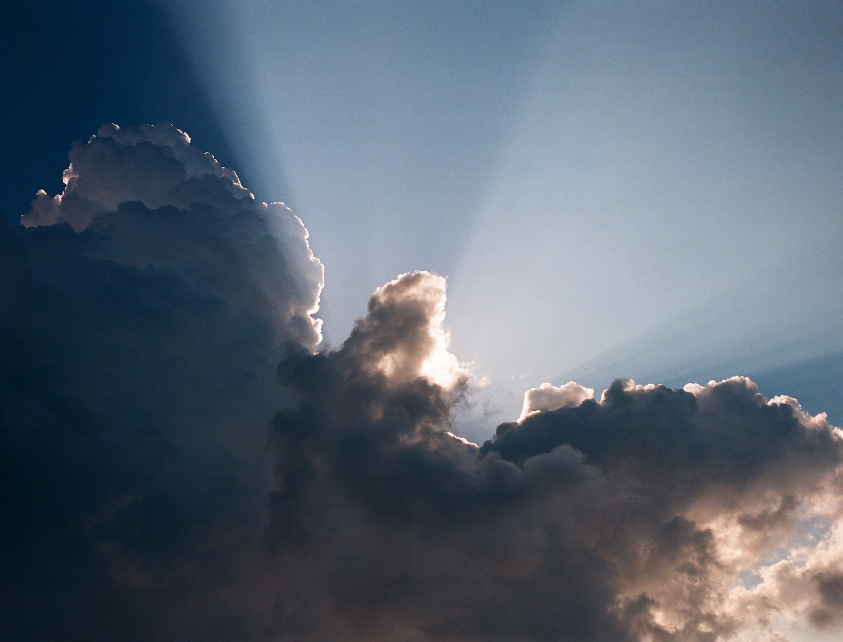 sun breaking through clouds