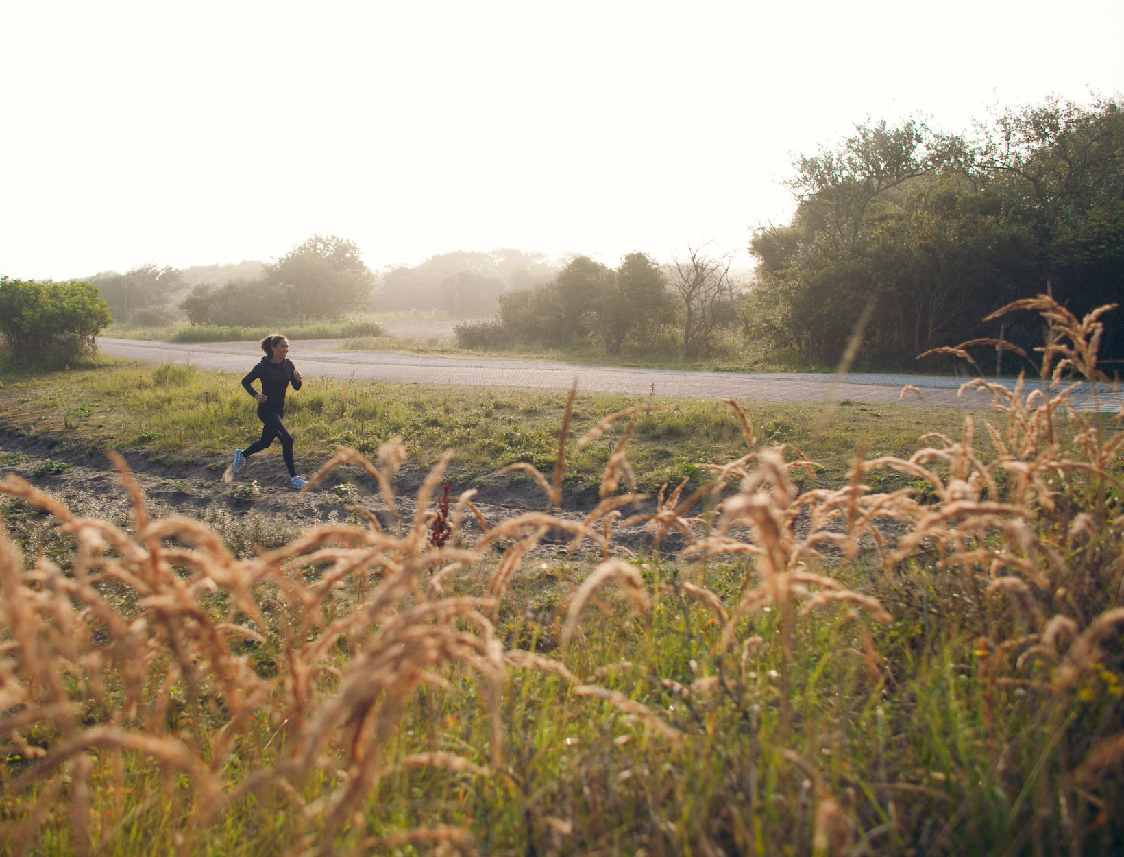 A woman running outdoors