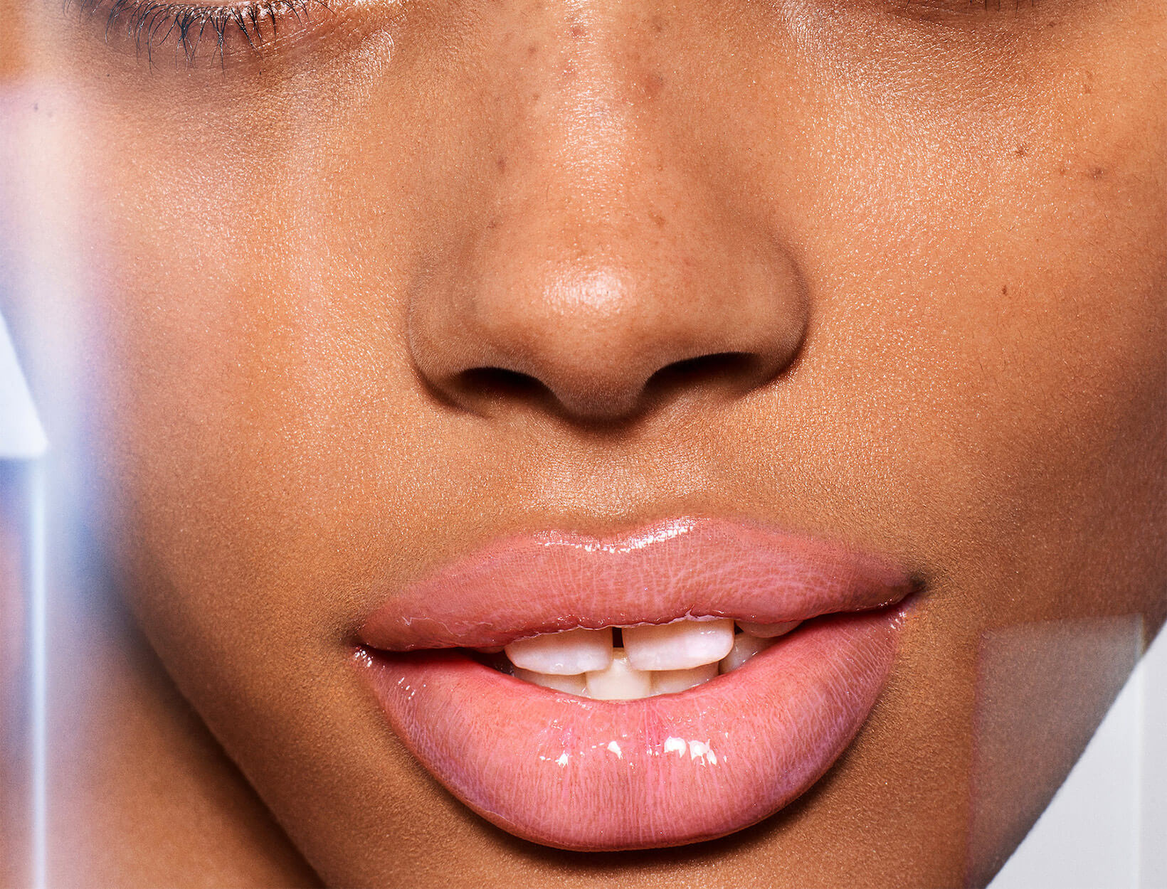 woman wearing lip gloss