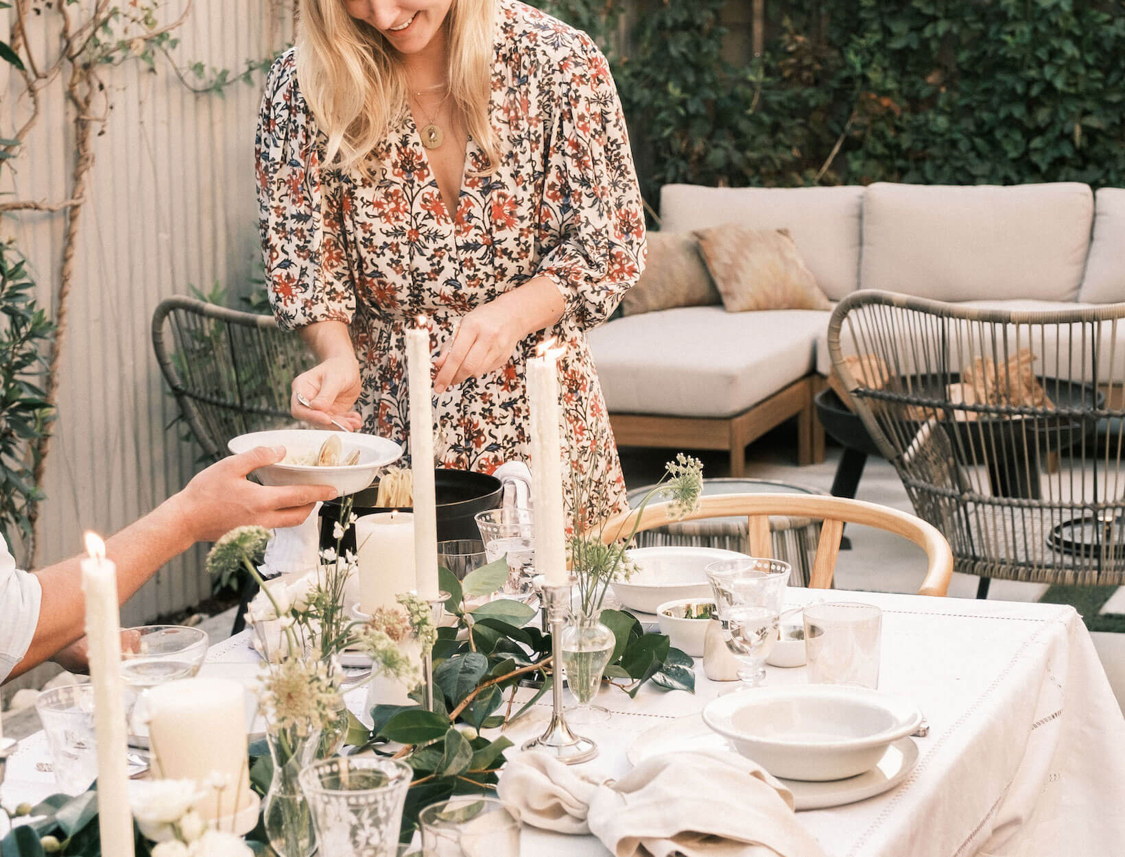 lady serving pasta at dinner