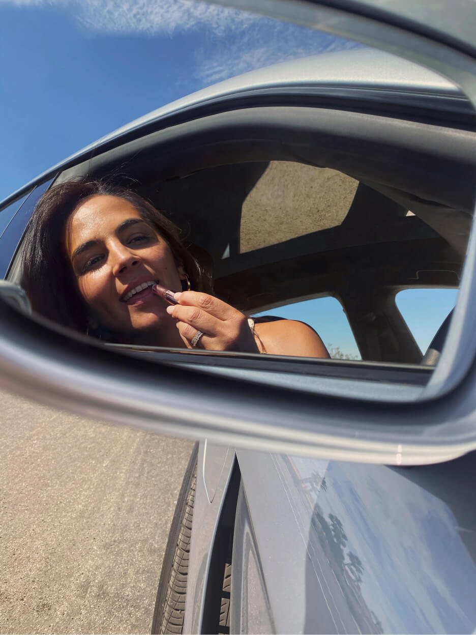 renee rupcich in a porsche