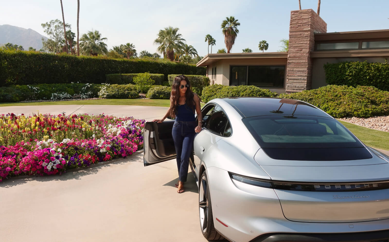 renee rupcich in a porsche