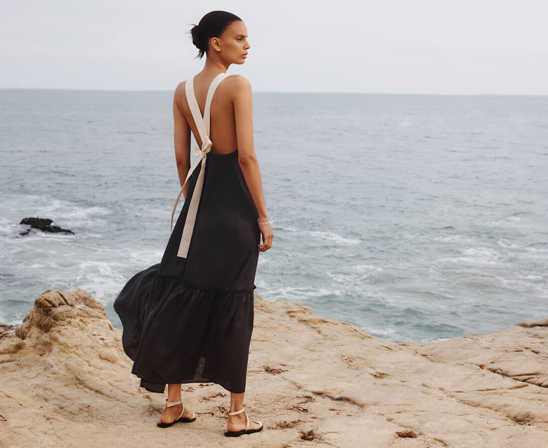 woman in g. label dress