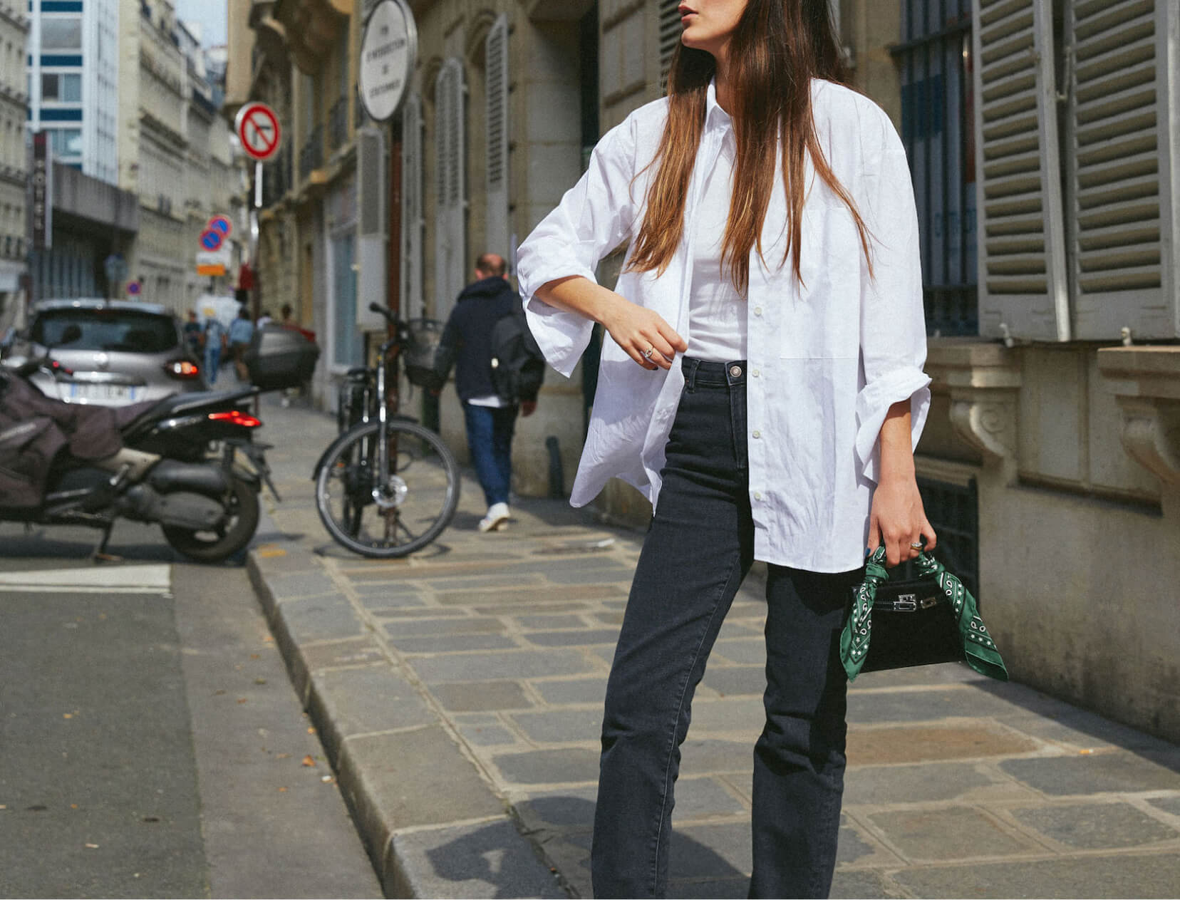 woman in white button-down shirt