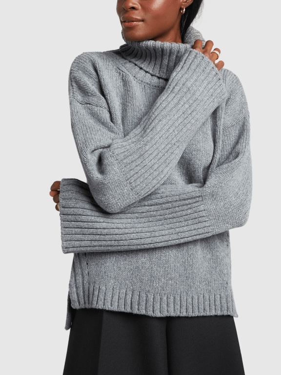 model wearing turtleneck sweater