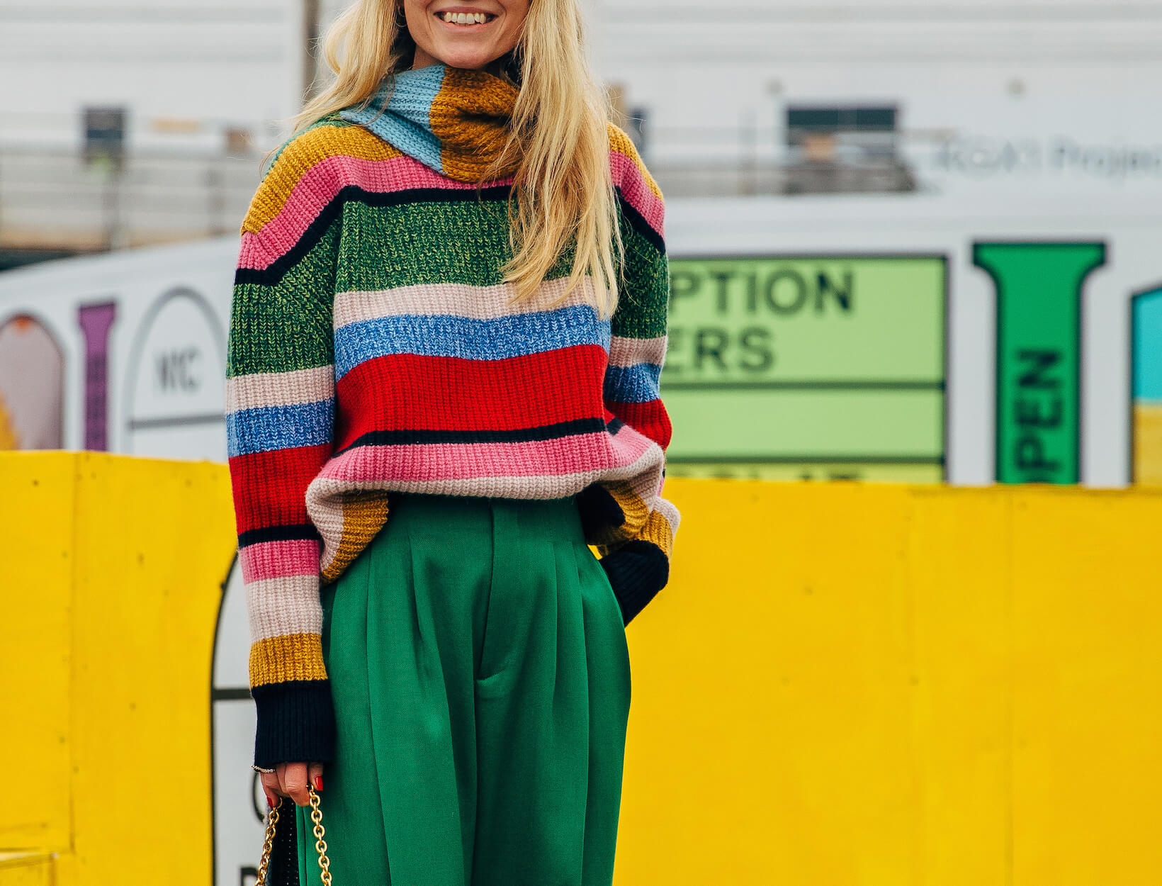 woman wearing a colorful sweater