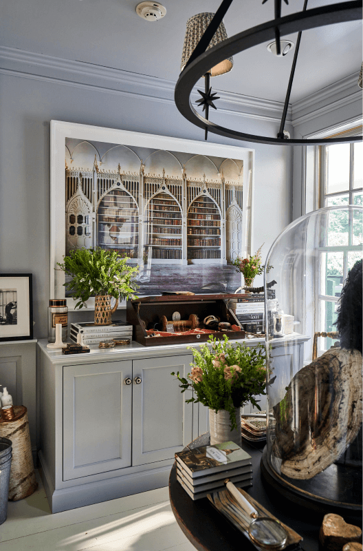 room interior with ample  partition  people     and plants