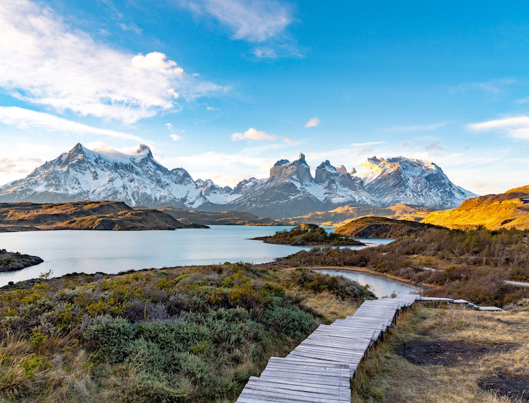 A Private Patagonian Island<br /><em>Argentina</em>“/><br />
<h3>A private Patagonian island<br />Argentina</h3>
<p>Have you heard of the Chef’s Table episode in which a Francis Mallmann in a beret roasted vegetables in the snow and sautéed fish on his private Patagonian island?  It turns out you can join him.  Mallmann regularly entertains his guests for a week, not just for dinner.  The chef and his team are masters at creating a magical environment for the whole family: fortresses in the trees, picnic lunches by the river, dinners by the fireplace in scenic spots across the island – we could go on and on.  The point is, this experience is so much more than seven nights of exquisite meals.  It’s an immersion in island life.  And before you think it’s just camping and al fresco dining, the island’s family lodge feels like the private home of a comfort-obsessed Argentine. </p>
</li>
<li><img decoding=