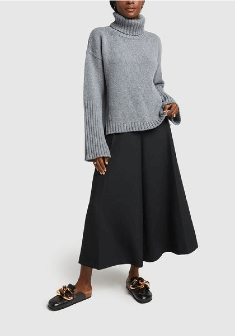 woman posing wearing G. Label