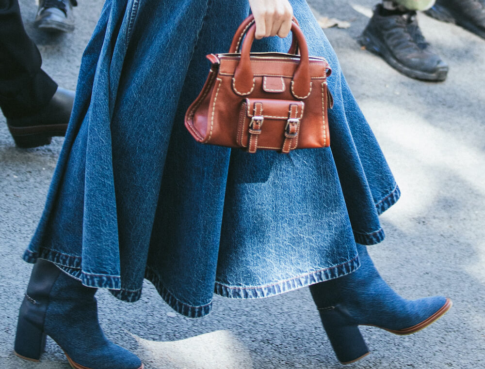 woman carrying a handbag