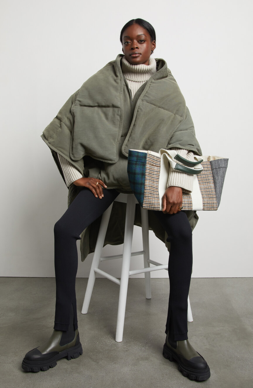 woman posing wearing sia coat