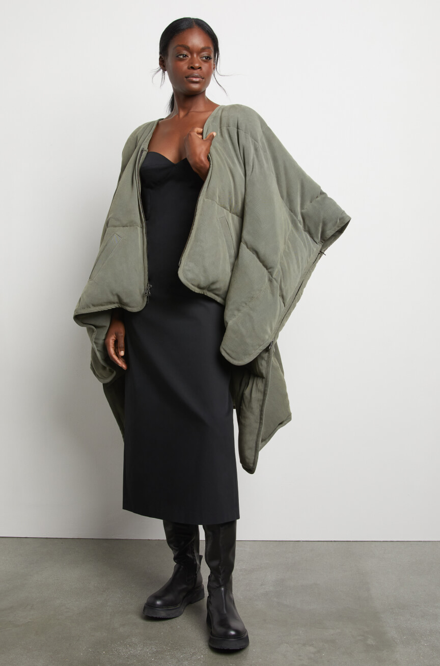 woman posing wearing sia coat