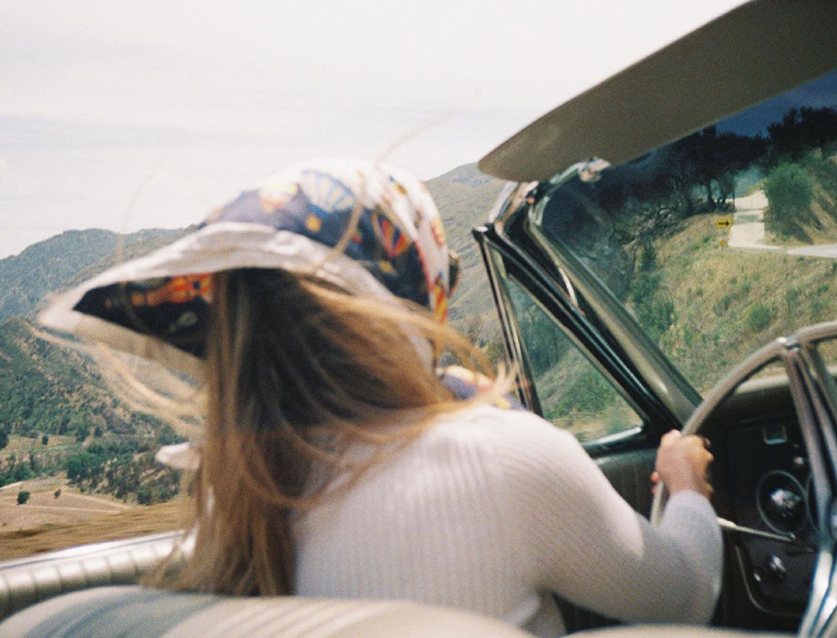 woman driving a convertible