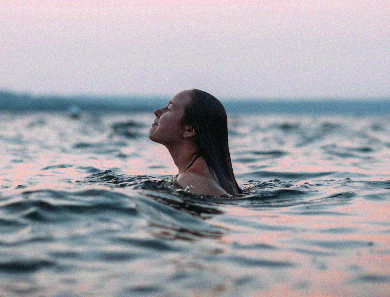 woman swims in the sea