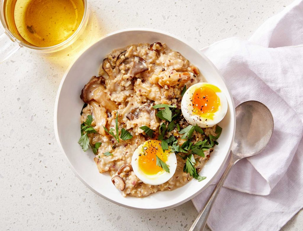 Tasty oats with mushrooms and eggs