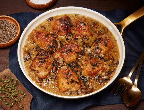 PAN-ROASTED CHICKEN THIGHS WITH MUSHROOMS AND THYME