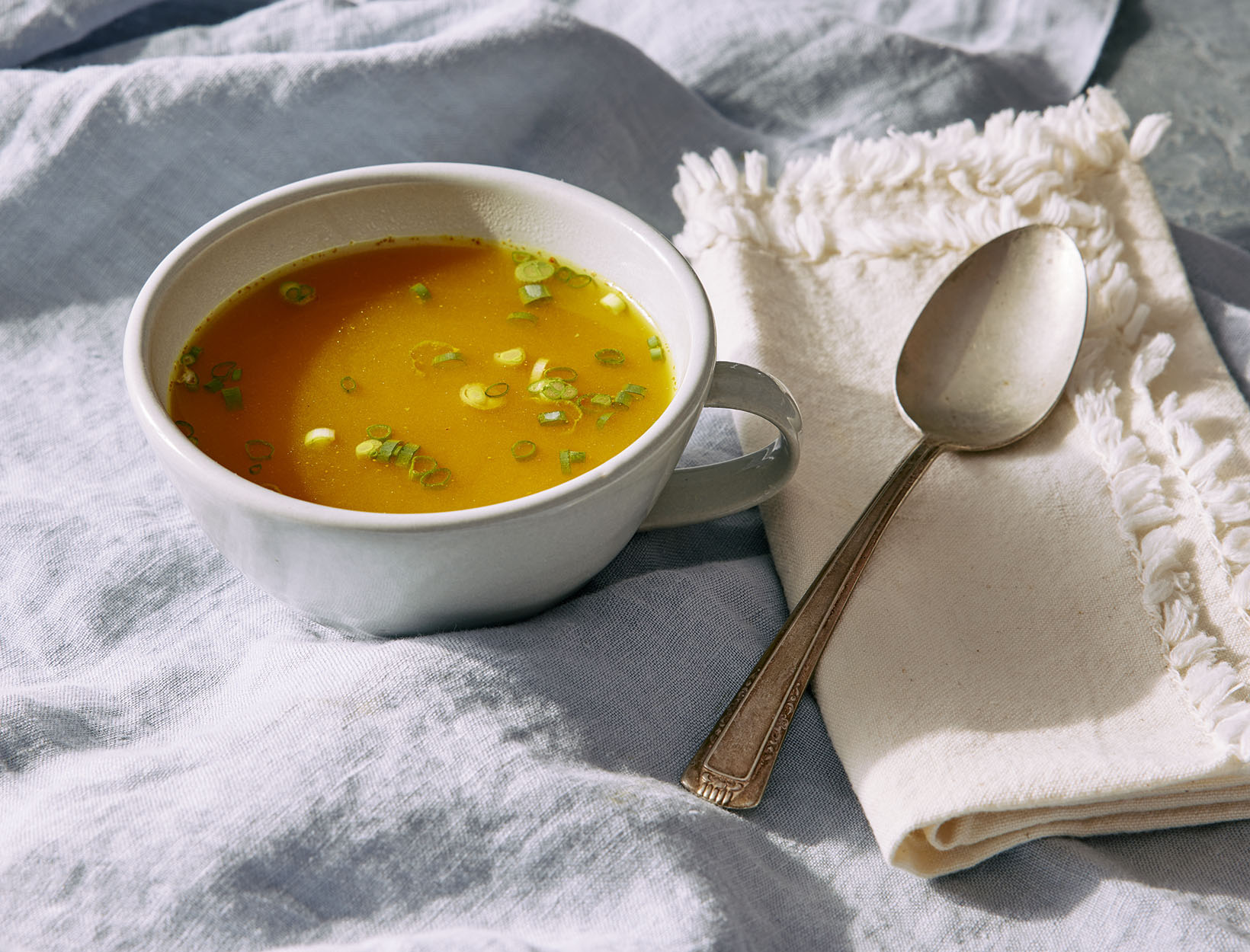 Turmeric-Spiced Bone Broth and Scallions