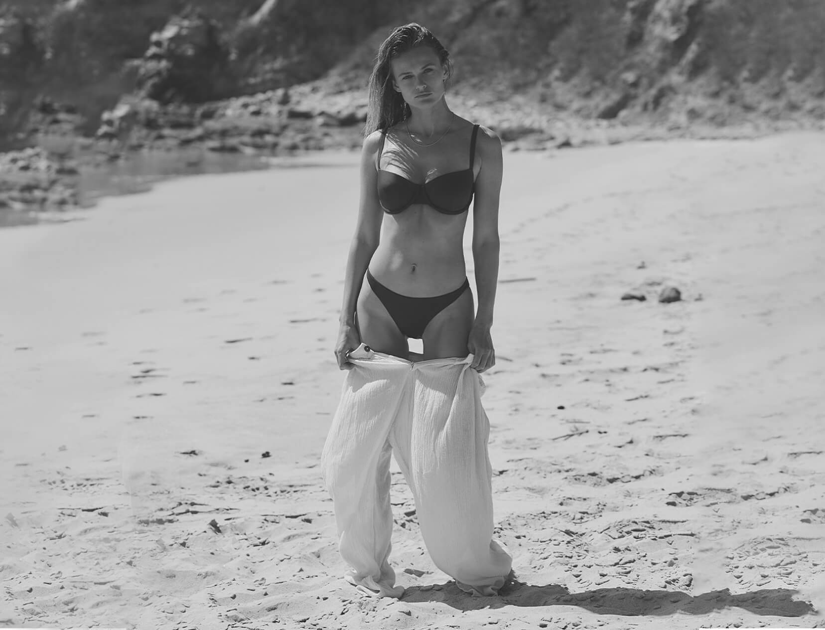 woman posing in bikini on the beach